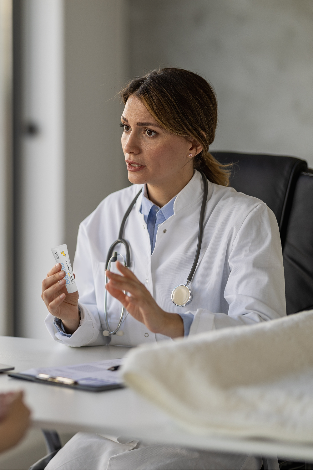 Health Care Professional like Pediatrician or Dermatologist recommending BioGaia Skincare Aldermis Probiotic Ointment with live probiotics for babies and children with dry, sensitive and atopic-prone skin.